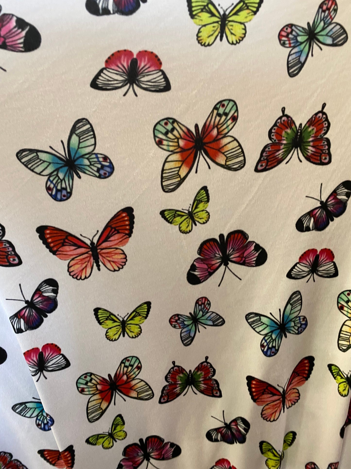 New butterflies design multicolor print on good quality stretch poly spandex 4-way stretch 58/60” Sold by the YD. Ships worldwide
