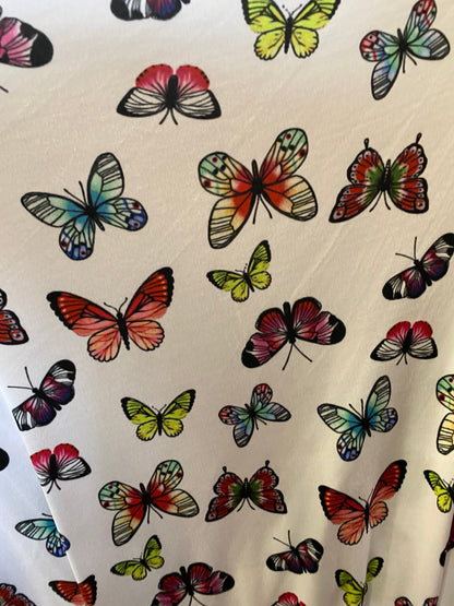New butterflies design multicolor print on good quality stretch poly spandex 4-way stretch 58/60” Sold by the YD. Ships worldwide