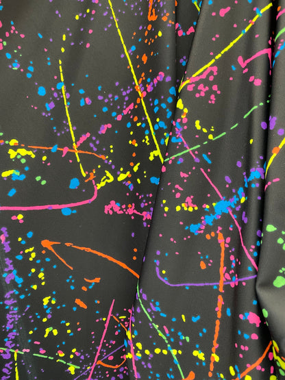 New Graffiti paint design black/multicolor nylon spandex 4-way stretch 58/60” Sold by the YD. Ships worldwide from Los Angeles California.