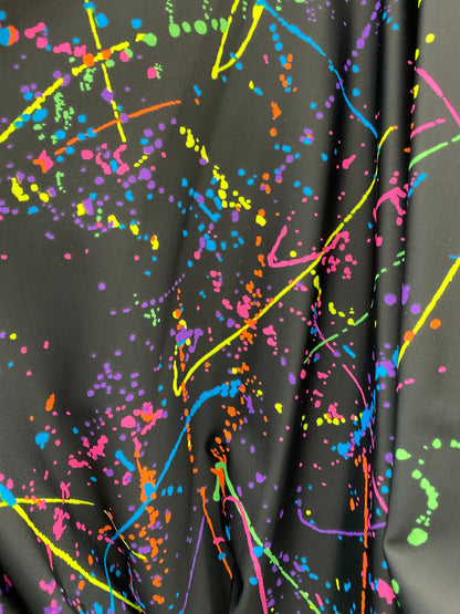 New Graffiti paint design black/multicolor nylon spandex 4-way stretch 58/60” Sold by the YD. Ships worldwide from Los Angeles California.