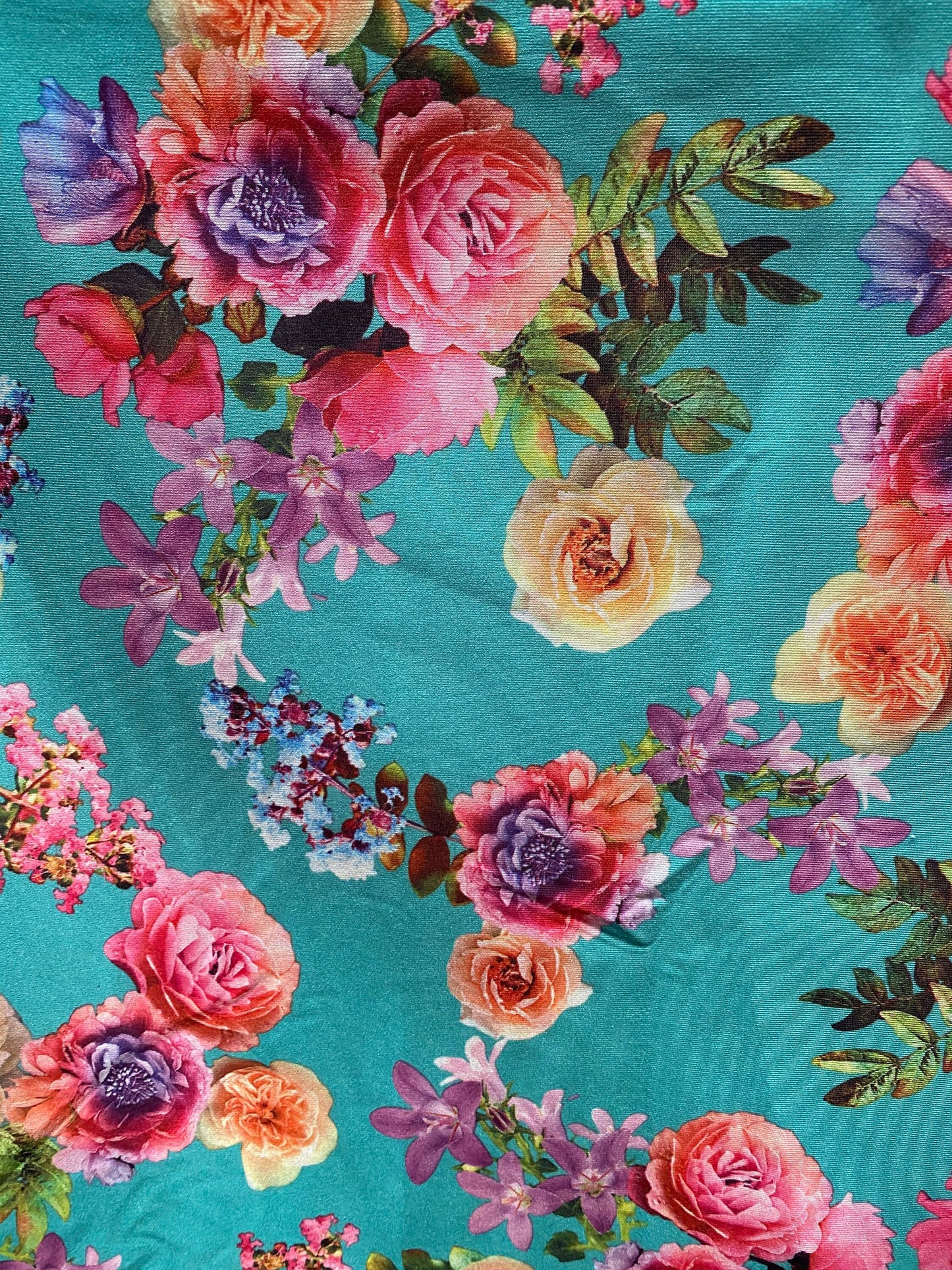 New flower design poly spandex 2-way stretch 58/60” Sold by the YD. Ships worldwide from Los Angeles California USA.