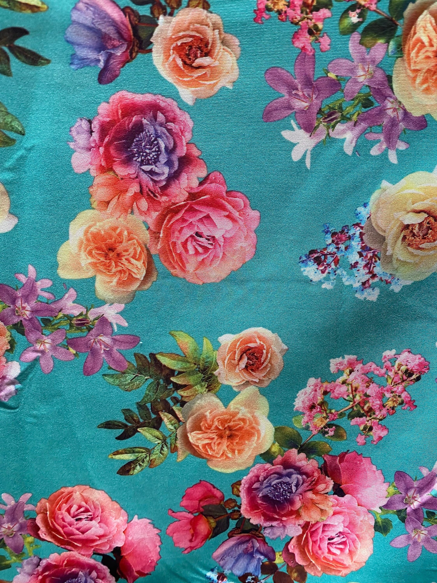 New flower design poly spandex 2-way stretch 58/60” Sold by the YD. Ships worldwide from Los Angeles California USA.