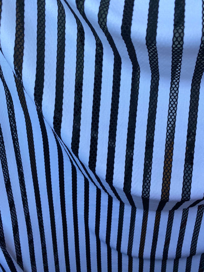 New stripes design nylon spandex with mesh stripes 4-way stretch 58-60” sold by the YD. Ships worldwide from Los Angeles California USA.