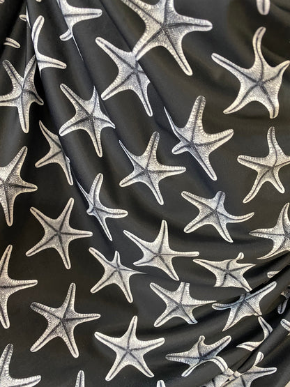 New starfish design print on nylon spandex 4-way stretch 58/60” Sold by the YD. Ships worldwide from Los Angeles California USA.