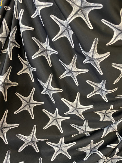 New starfish design print on nylon spandex 4-way stretch 58/60” Sold by the YD. Ships worldwide from Los Angeles California USA.