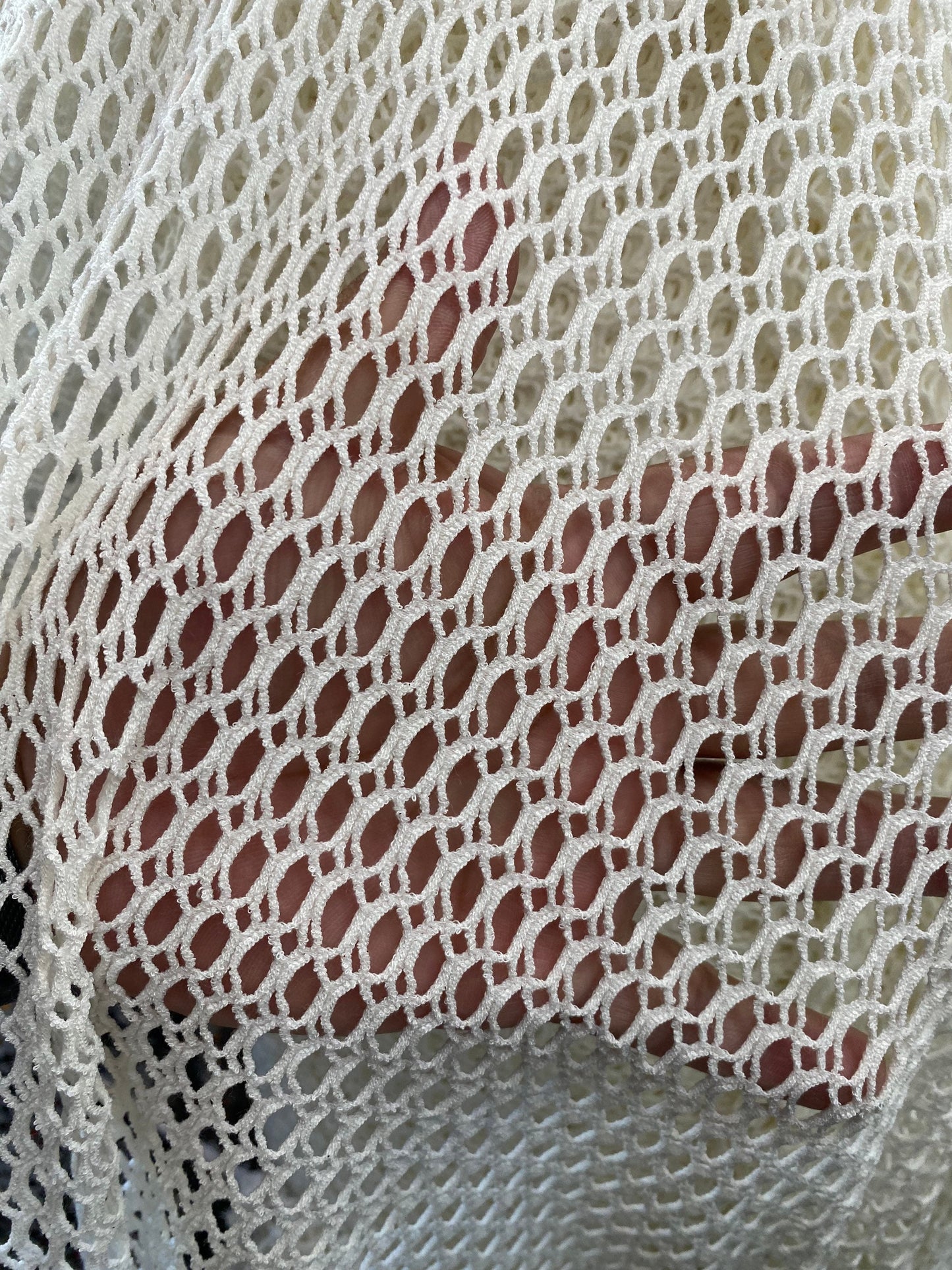 New 3D fishnet off white 2-way stretch 58/60” Sold by the YD. Ships worldwide from Los Angeles California USA.