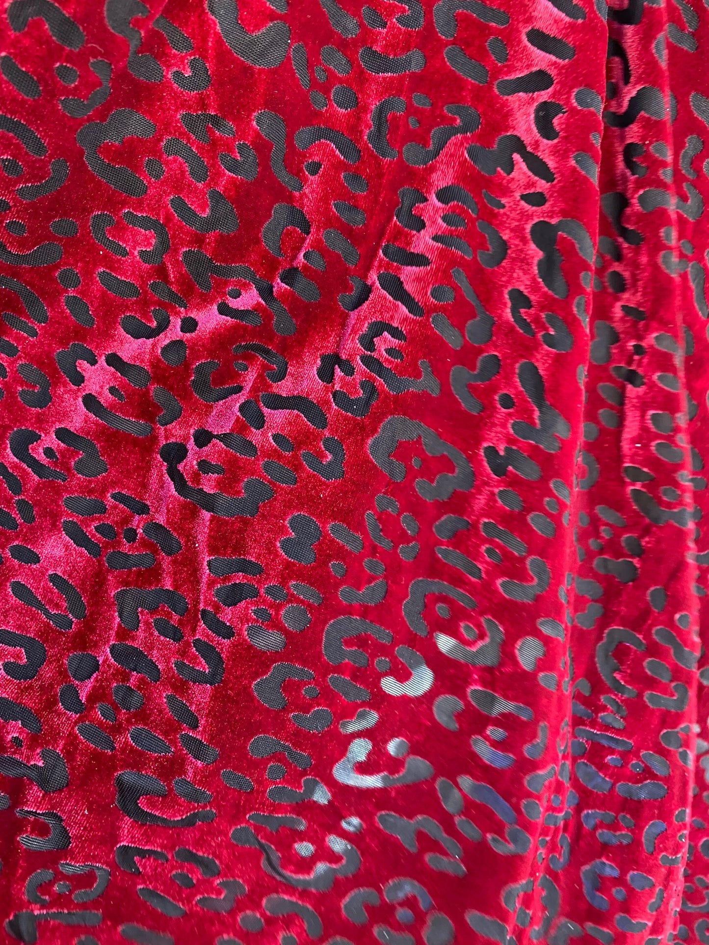 New burnout velvet leopard design black/DK red 4-way stretch 58/60” Sold by the YD. Ships worldwide from Los Angeles California USA.
