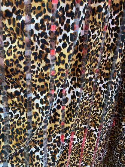 New leopard design stripe mesh spandex 4-way Stretch 58/60” Sold by the YD. Ships worldwide from Los Angeles California USA.
