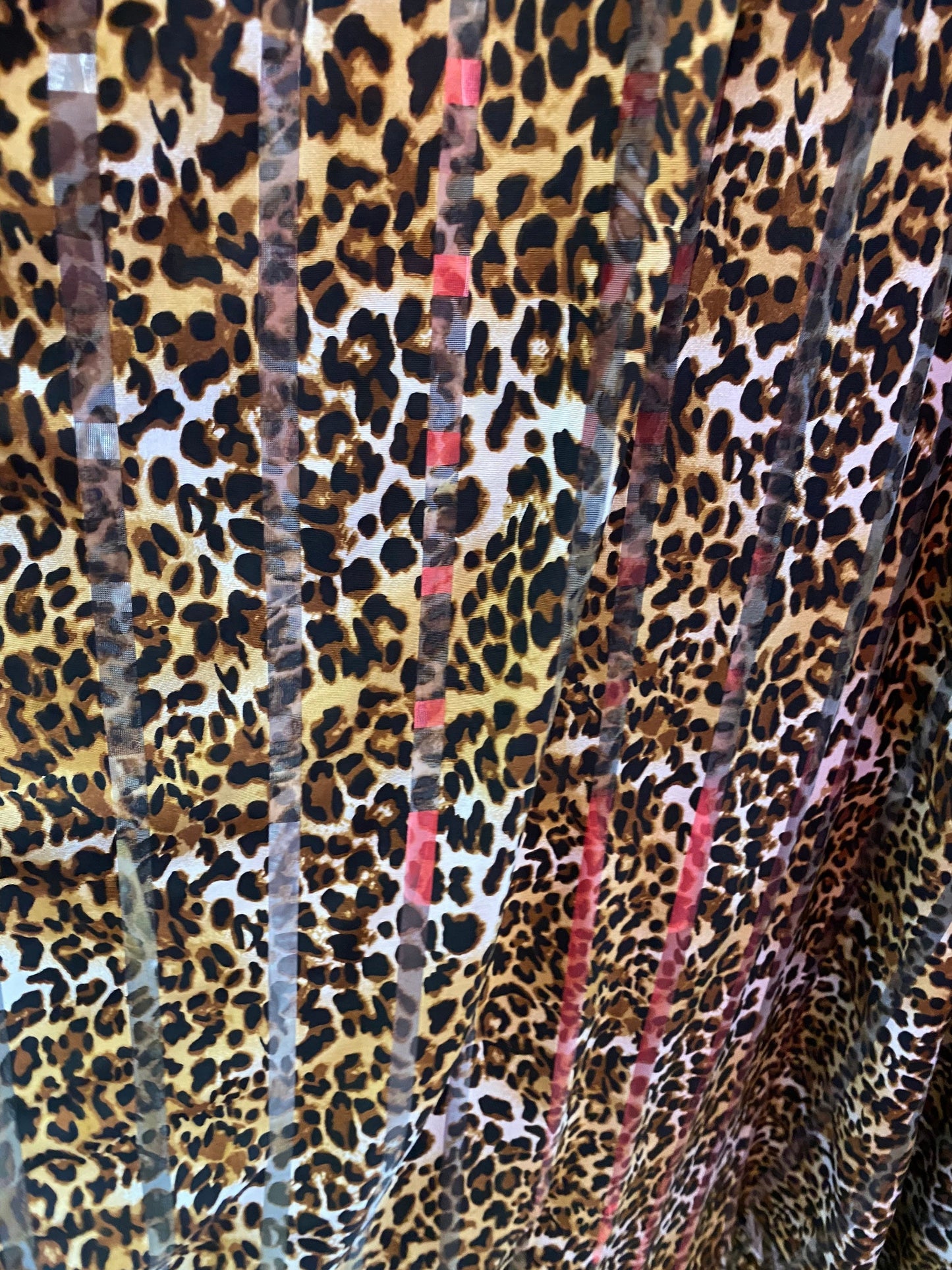 New leopard design stripe mesh spandex 4-way Stretch 58/60” Sold by the YD. Ships worldwide from Los Angeles California USA.