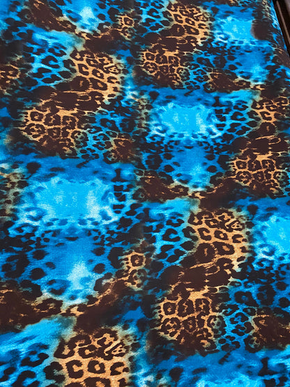 New exotic leopard design teal/brown print on poly spandex medium weight 4-way stretch 58/60” Sold by the YD. Ships worldwide from L.A CA.