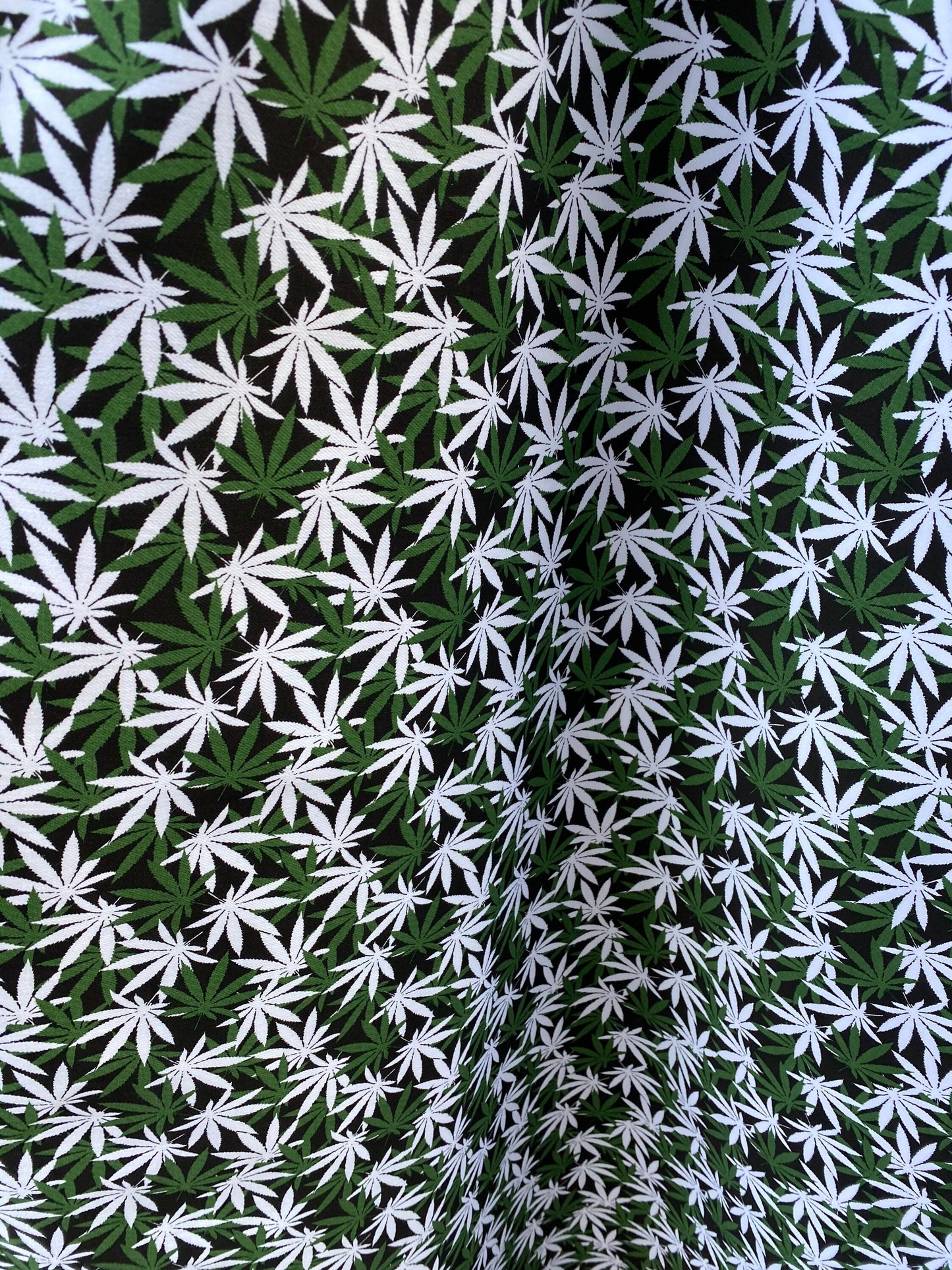 New marijuana design print on poly cotton twill 2way stretch 54/55” Sold by the YD. Ships worldwide from Los Angeles California USA.