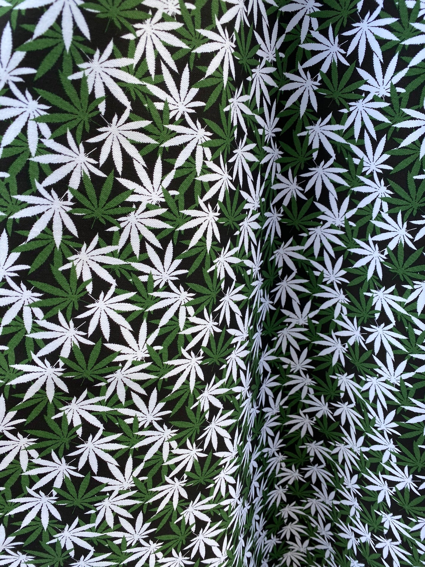 New marijuana design print on poly cotton twill 2way stretch 54/55” Sold by the YD. Ships worldwide from Los Angeles California USA.