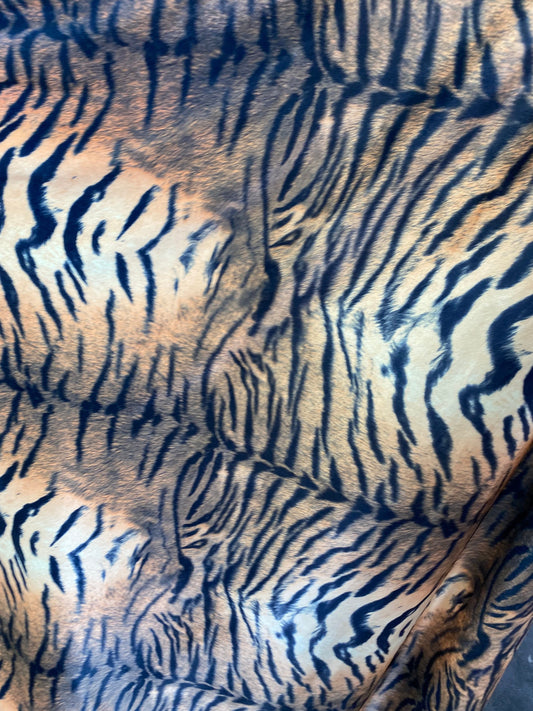 New exotic tiger design print on stretch velvet best quality 58/60” Sold by the YD. Ships worldwide from Los Angeles California USA.