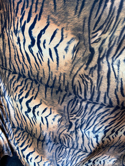 New exotic tiger design print on stretch velvet best quality 58/60” Sold by the YD. Ships worldwide from Los Angeles California USA.