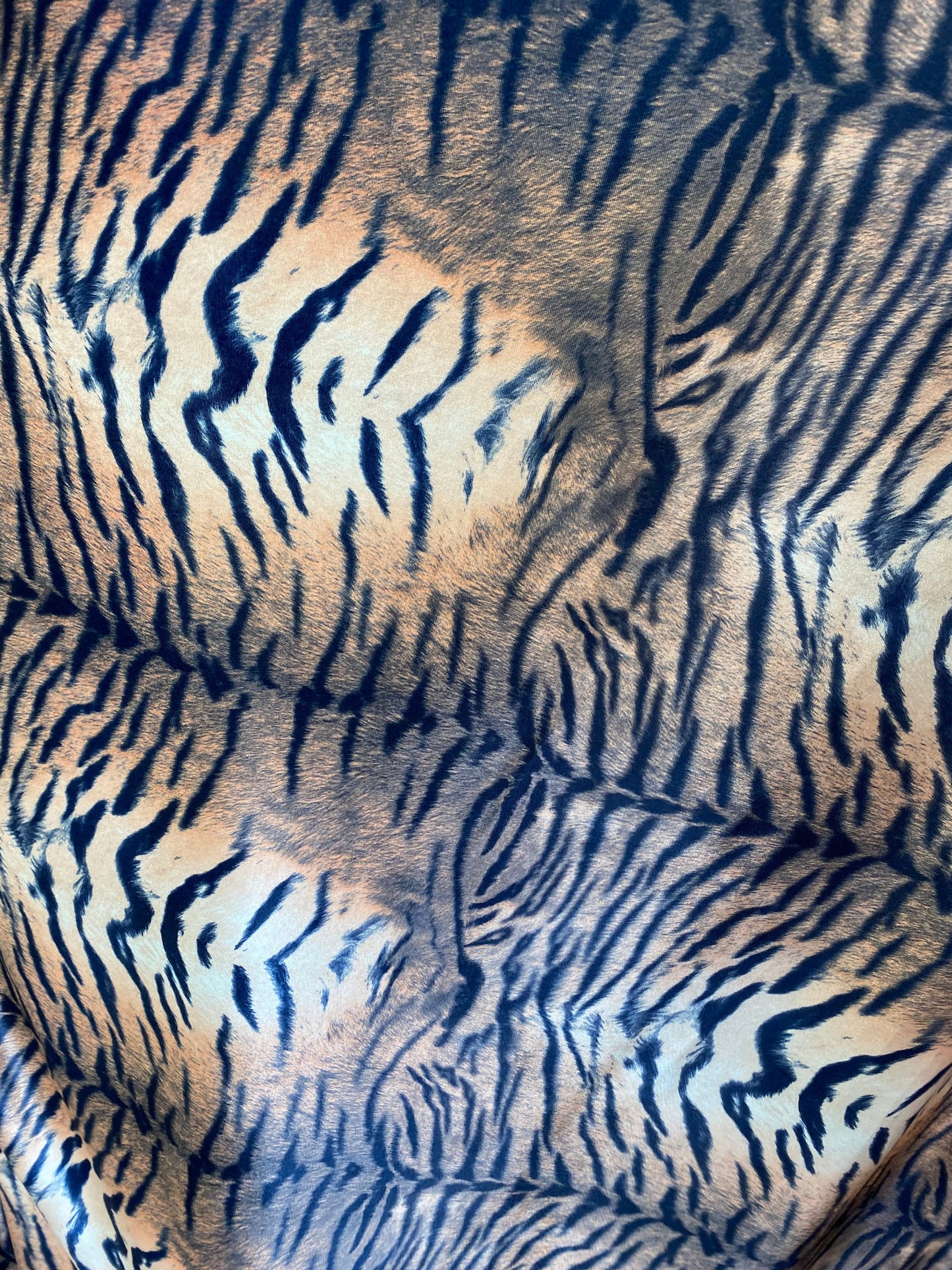 New exotic tiger design print on stretch velvet best quality 58/60” Sold by the YD. Ships worldwide from Los Angeles California USA.