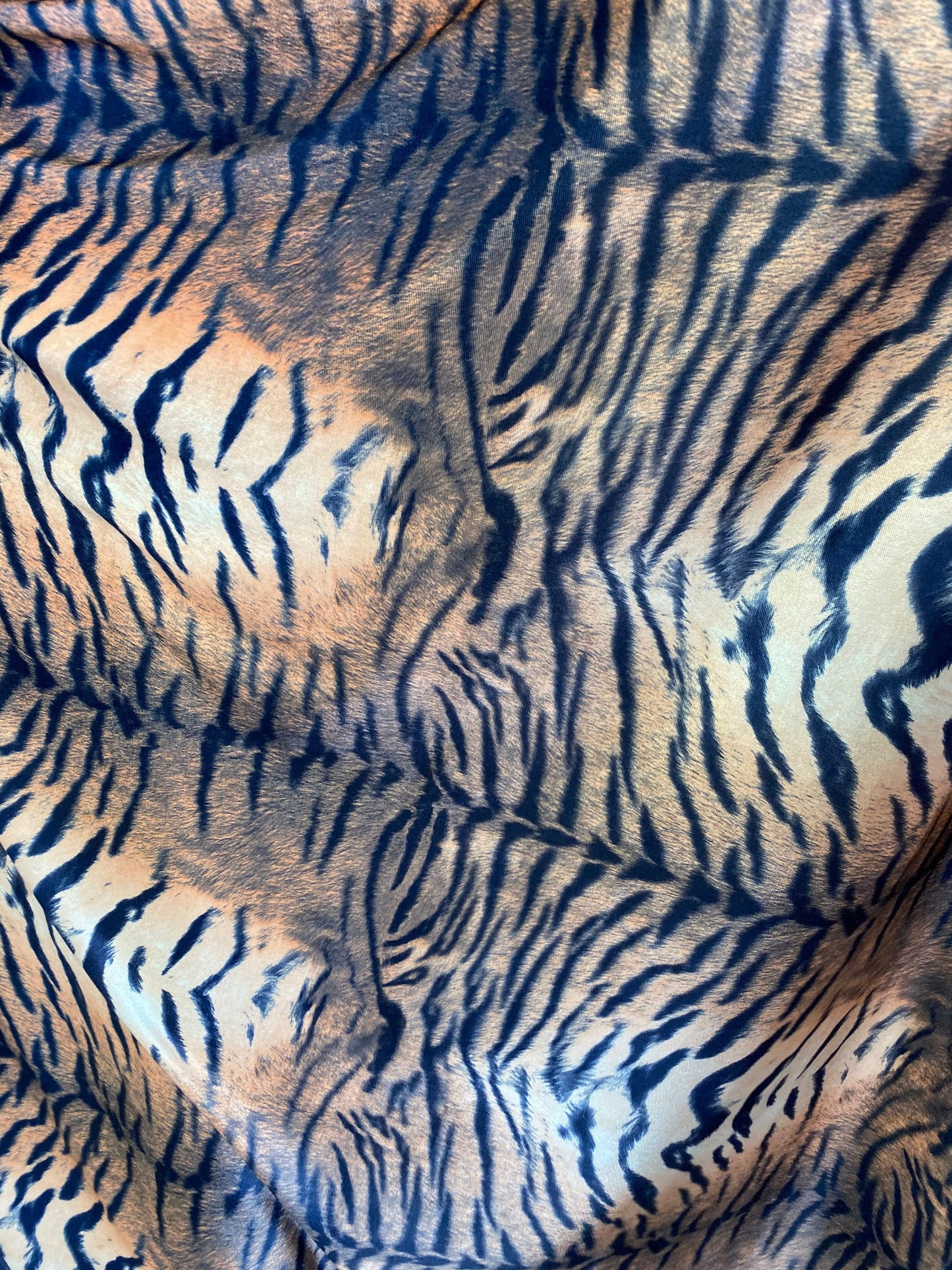 New exotic tiger design print on stretch velvet best quality 58/60” Sold by the YD. Ships worldwide from Los Angeles California USA.