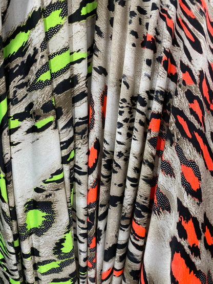 Animal print design great quality medium weight poly spandex 4-way stretch 58/60” Sold by the YD. Ships worldwide from Los Angeles CA USA.