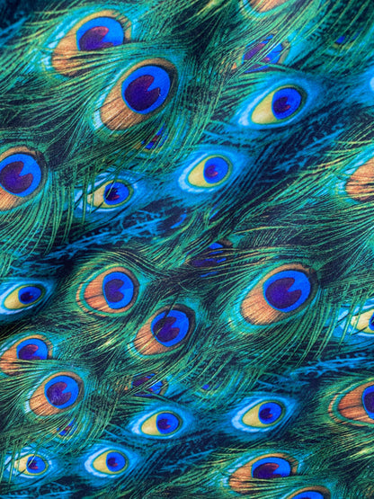 Peacock design print of great quality of nylon spandex 4-way stretch 58/60” Sold by the YD. Ships worldwide from Los Angeles California USA.