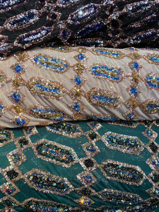 New geometric avatar iridescent sequins on stretch mesh 4-way 50/52” Sold by the YD. Ships worldwide from Los Angeles California USA.