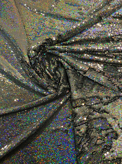 New hologram silver/silver reversible flip up sequins on spandex base 2-way stretch 58/60” Sold by the YD. Ships worldwide from Los Angeles