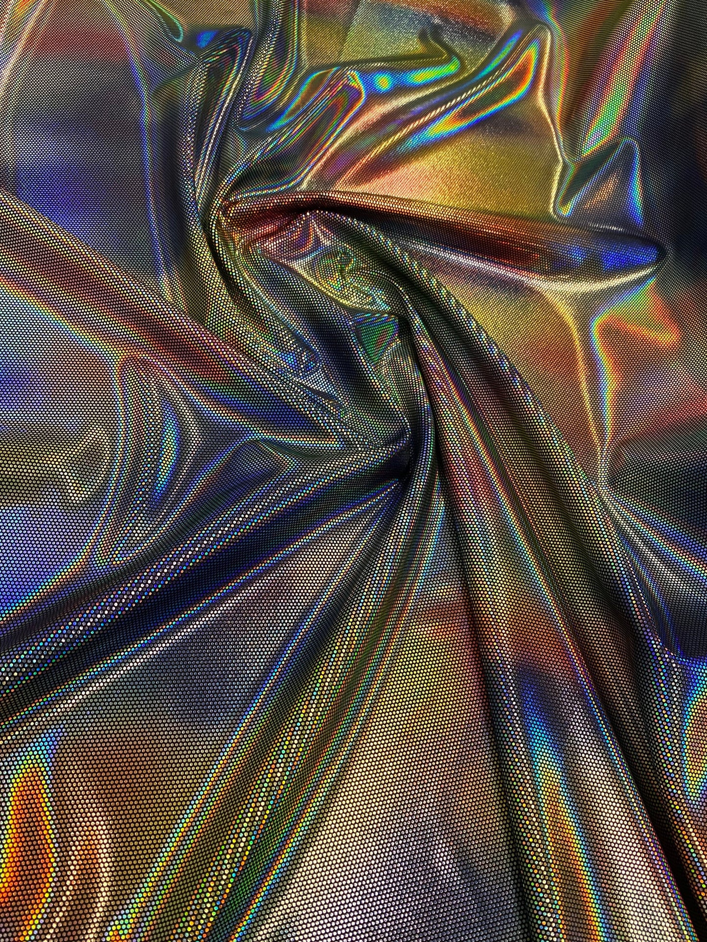 Luxury Spectrum iridescent hologram metallic foil on stretch velvet 58/60” 4-way stretch 58/60” Sold by the YD. Ships worldwide from L.A CA.