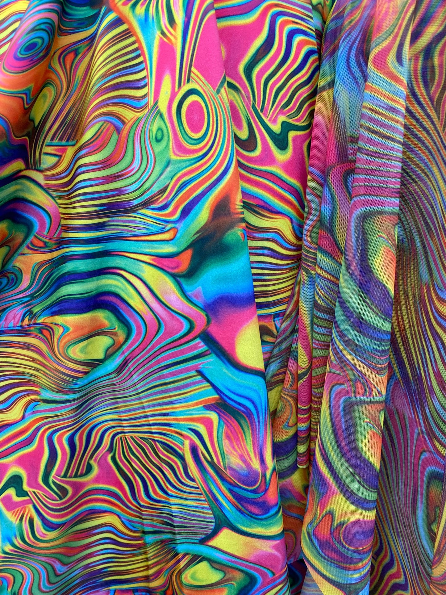 New modern abstract design print on great quality of nylon spandex and power mesh 4-way stretch 58/60” Sold by the YD.