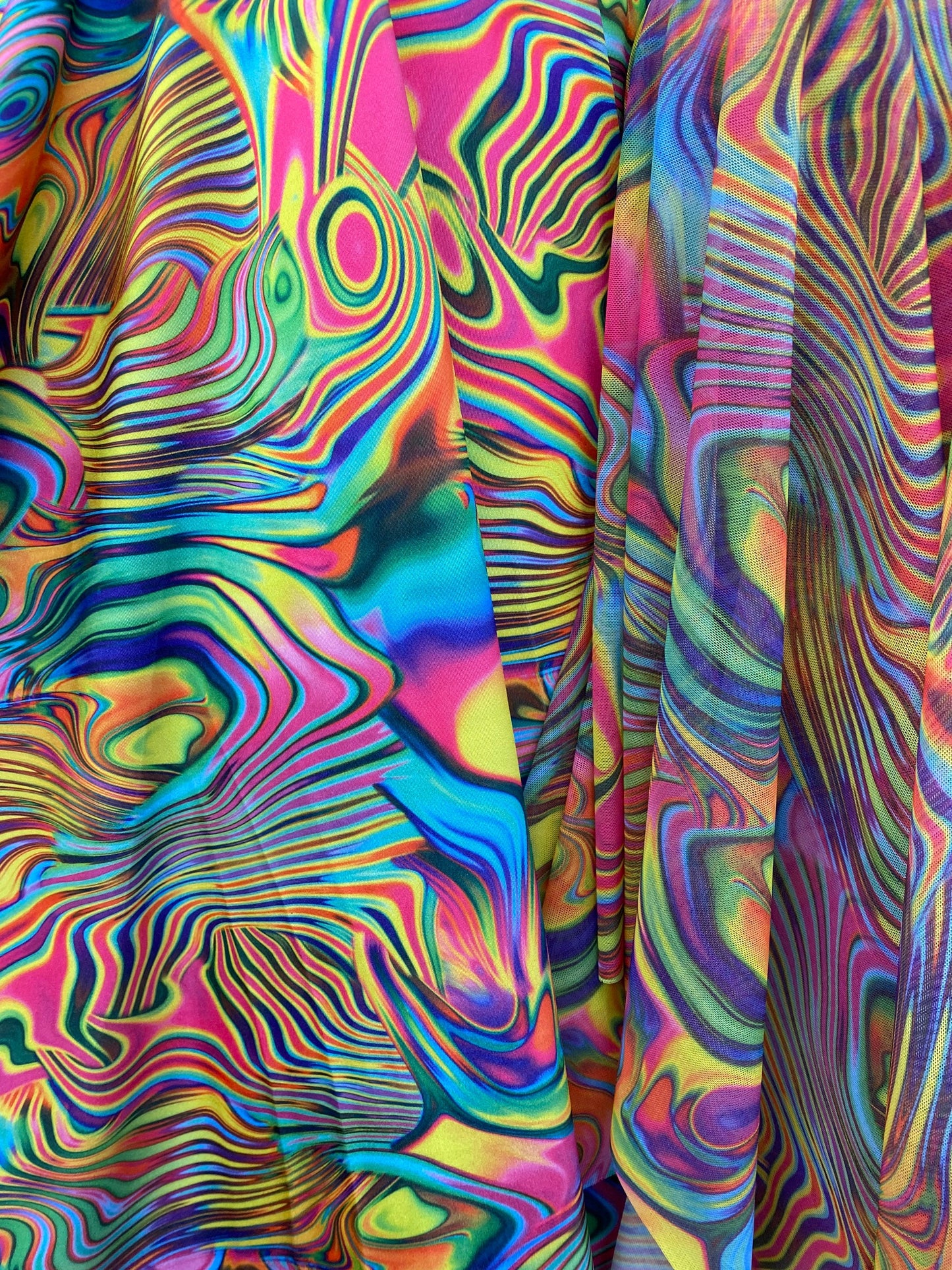 New modern abstract design print on great quality of nylon spandex and power mesh 4-way stretch 58/60” Sold by the YD.