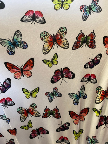New butterflies design multicolor print on good quality stretch poly spandex 4-way stretch 58/60” Sold by the YD. Ships worldwide