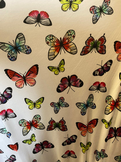 New butterflies design multicolor print on good quality stretch poly spandex 4-way stretch 58/60” Sold by the YD. Ships worldwide