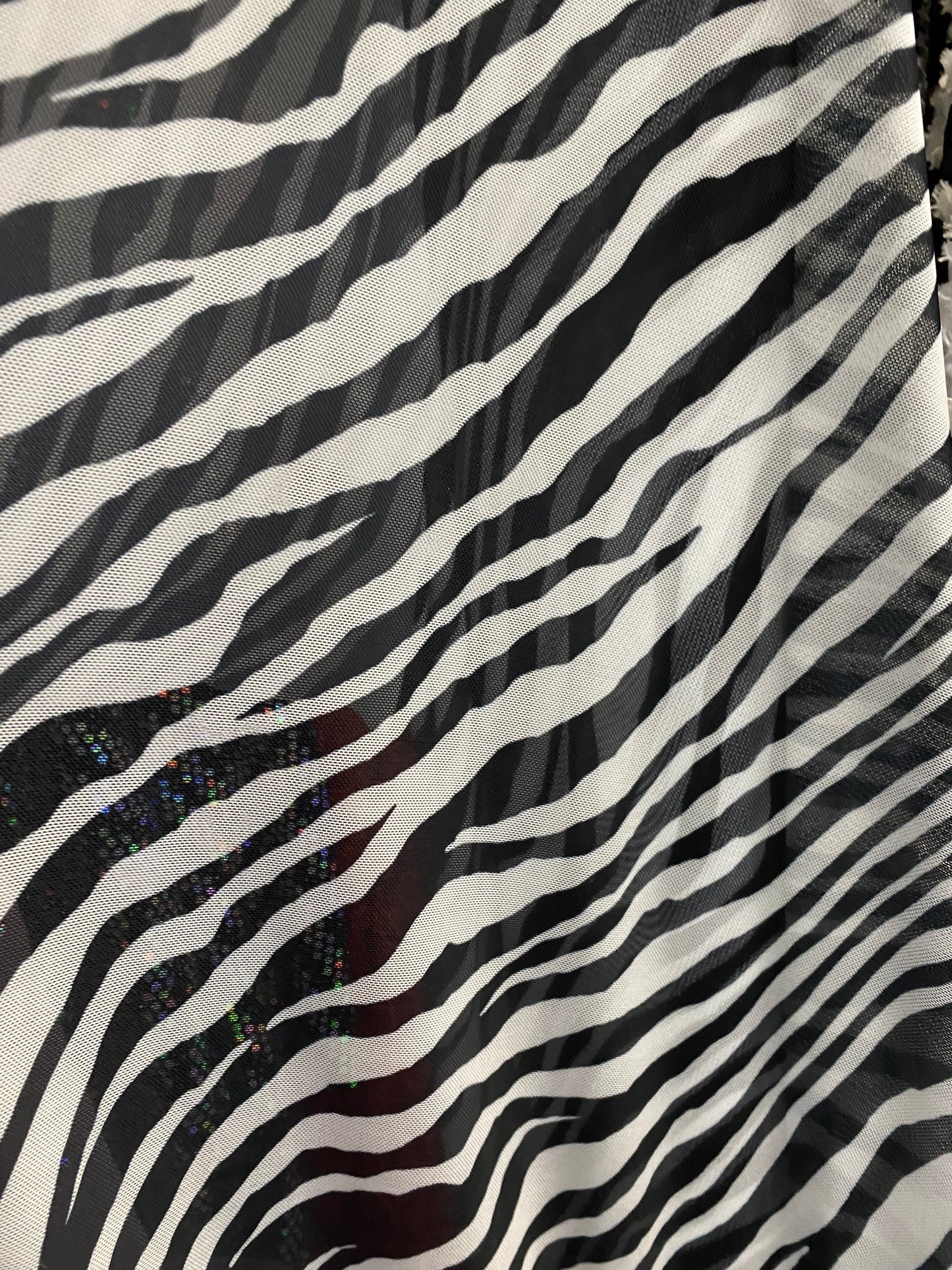 Zebra design exotic print on good quality of power mesh 4-way stretch 58/60” Sold by the YD. Ships worldwide from Los Angeles California USA