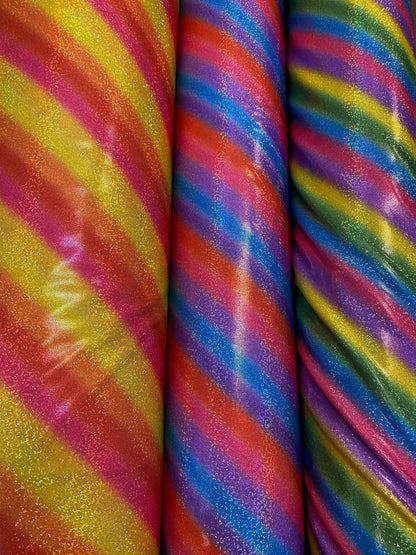 New Luxury rainbow with foggy hologram foil metallic nylon spandex 4-way stretch 58/60” Sold by the YD. Ships worldwide from L.A
