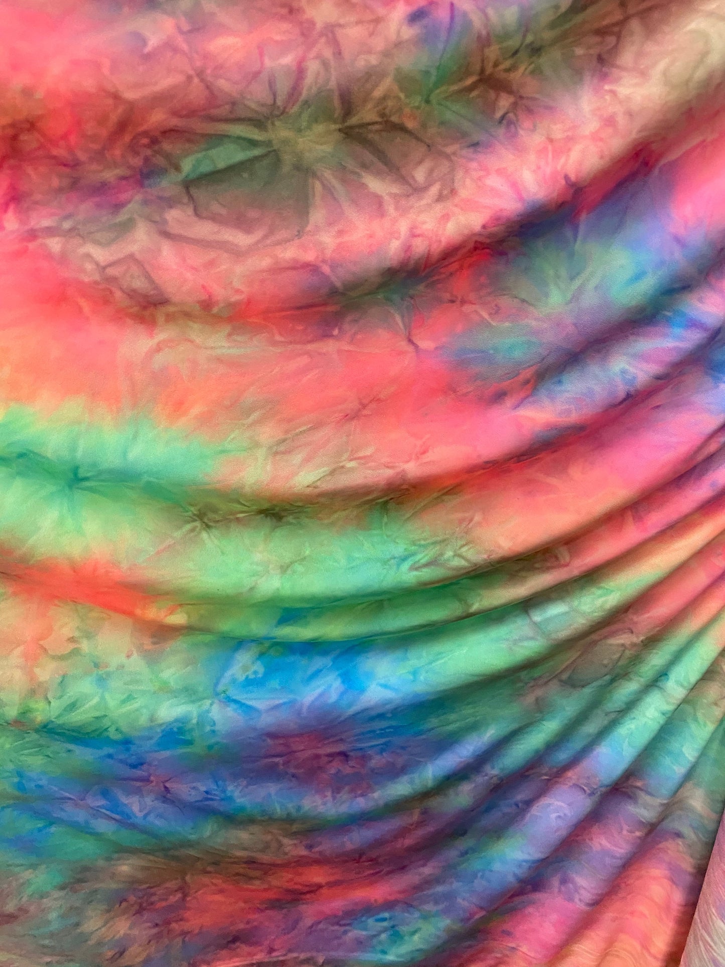 New tie dye pastel colors print on  poly spandex medium weight 4-way stretch 58/60” Sold by the YD. Ships worldwide from Los Angeles