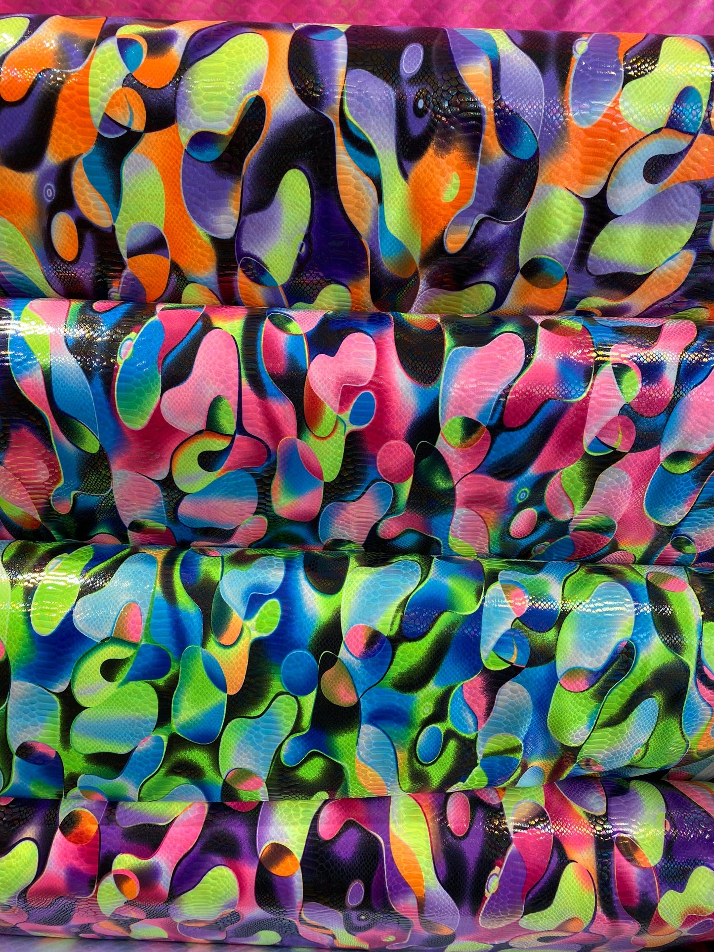 Anaconda snake design print on nylon spandex with iridescent clear foil UV light neon colors it glows in the dark 4-way stretch 58/60” Wide