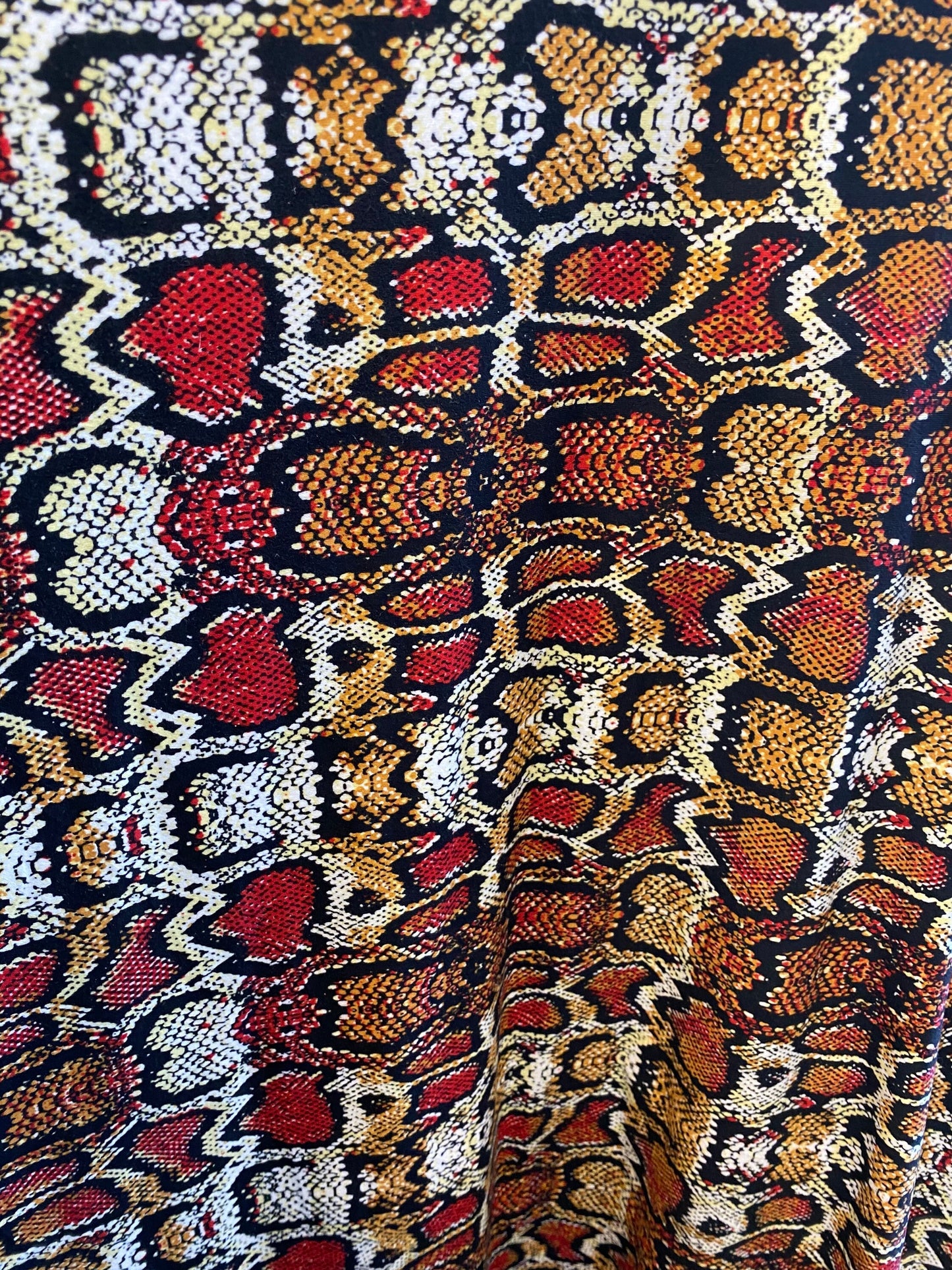 New Exotic snake design print on poly spandex matte medium weight 2-way stretch 58/60” Sold by the YD. Ships worldwide from Los Angeles CA.