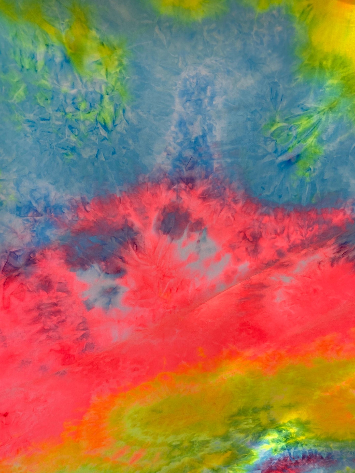 New tie dye rainbow poly spandex medium weight 4-way stretch 58/60” Sold by the YD. Ships worldwide from Los Angeles California USA.