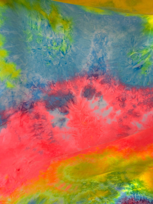 New tie dye rainbow poly spandex medium weight 4-way stretch 58/60” Sold by the YD. Ships worldwide from Los Angeles California USA.