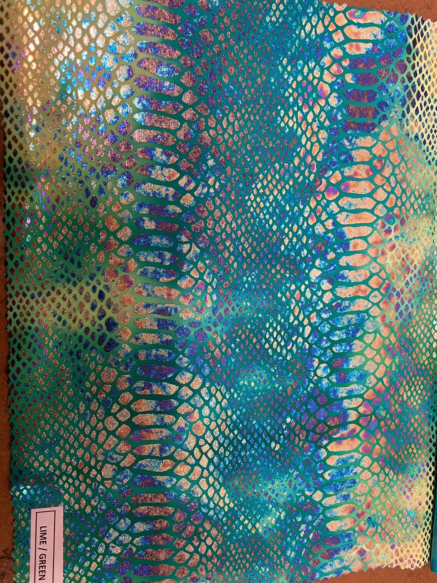 Amazon snake print design tie dye hologram nylon spandex 4-way Stretch 58/60” Sold by the YD. Ships worldwide from Los Angeles California US