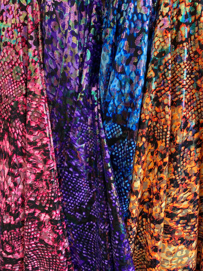 Iridescent metallic nylon spandex Cobra design 4way stretch 58/60” Sold by the YD. Ships worldwide from Los Angeles California USA
