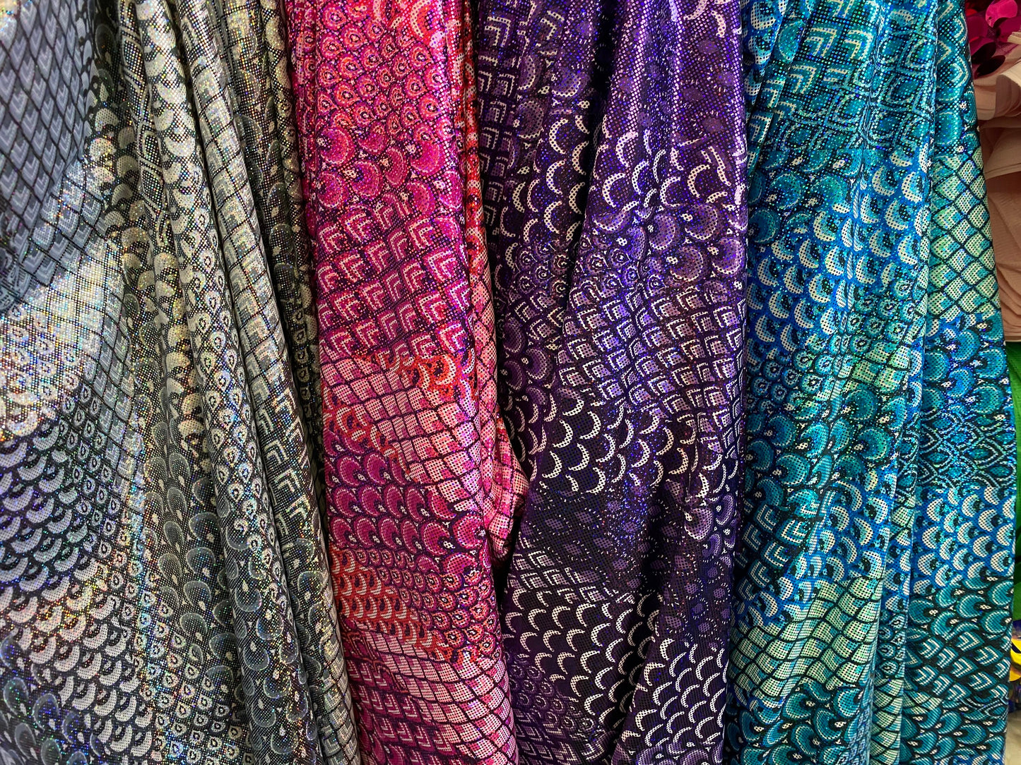 New Exotic peacock design hologram metallic nylon spandex 4-way stretch 58/60” Sold by the YD. Ships worldwide from Los Angeles California