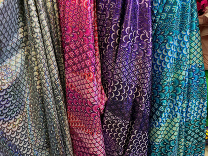 New Exotic peacock design hologram metallic nylon spandex 4-way stretch 58/60” Sold by the YD. Ships worldwide from Los Angeles California