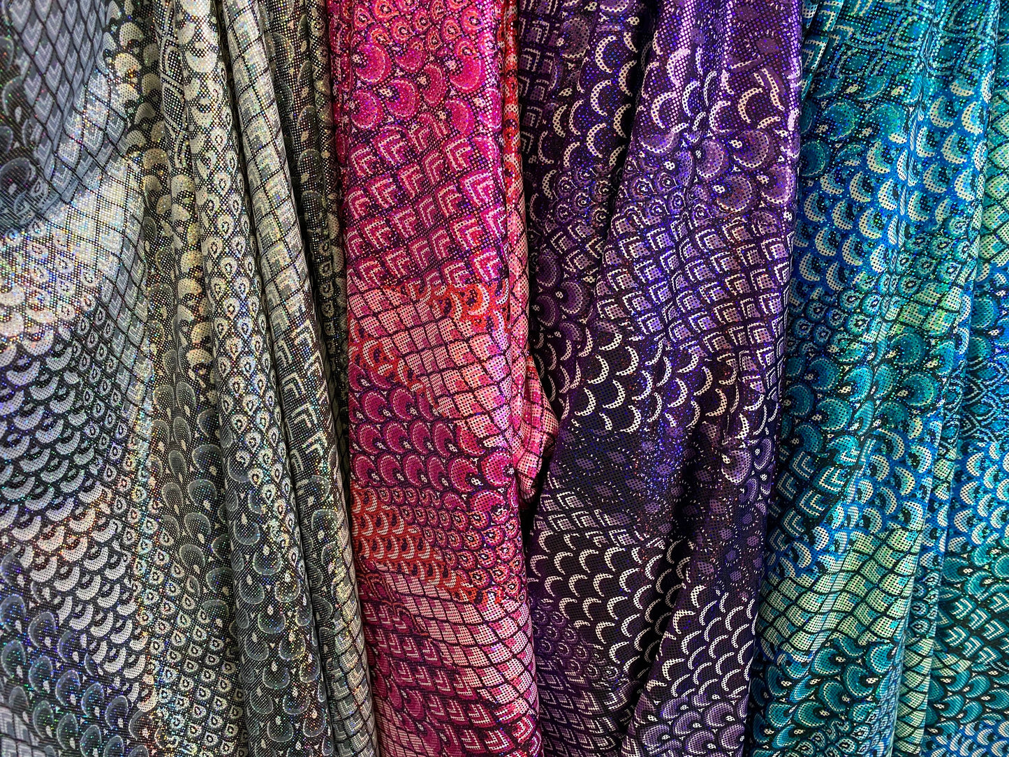 New Exotic peacock design hologram metallic nylon spandex 4-way stretch 58/60” Sold by the YD. Ships worldwide from Los Angeles California