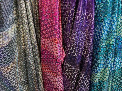 New Exotic peacock design hologram metallic nylon spandex 4-way stretch 58/60” Sold by the YD. Ships worldwide from Los Angeles California