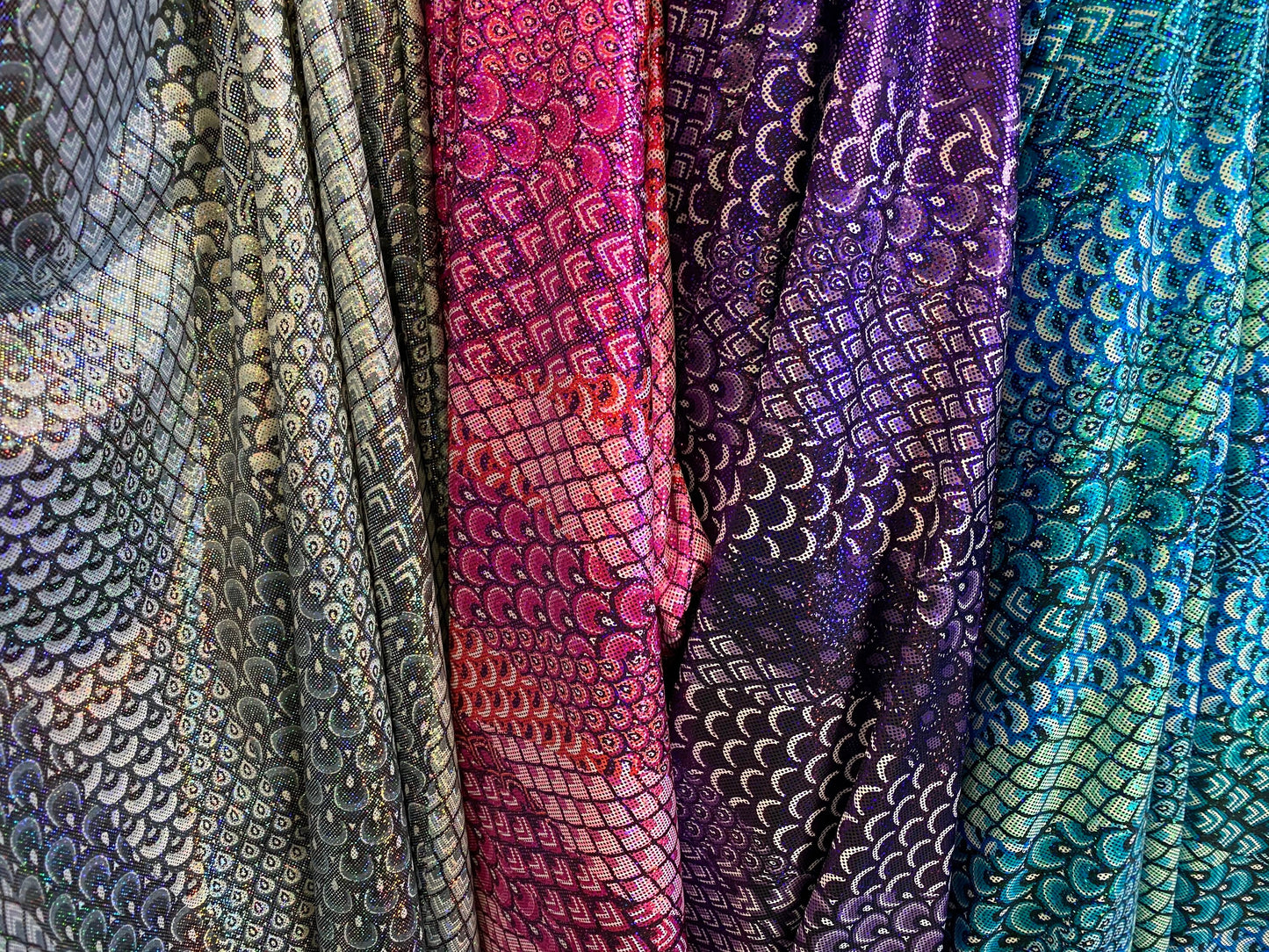 New Exotic peacock design hologram metallic nylon spandex 4-way stretch 58/60” Sold by the YD. Ships worldwide from Los Angeles California