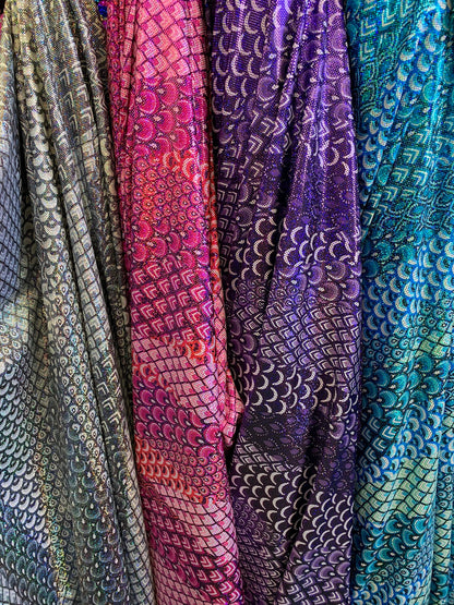 New Exotic peacock design hologram metallic nylon spandex 4-way stretch 58/60” Sold by the YD. Ships worldwide from Los Angeles California