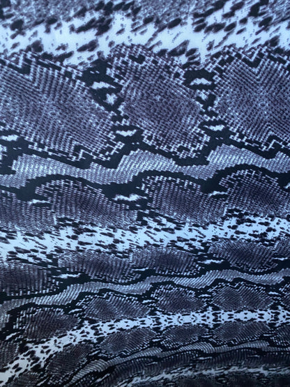 New exotic snake design gray/white/black print on poly techno 2-way stretch medium weight 58/60” Sold by the YD. Ships worldwide