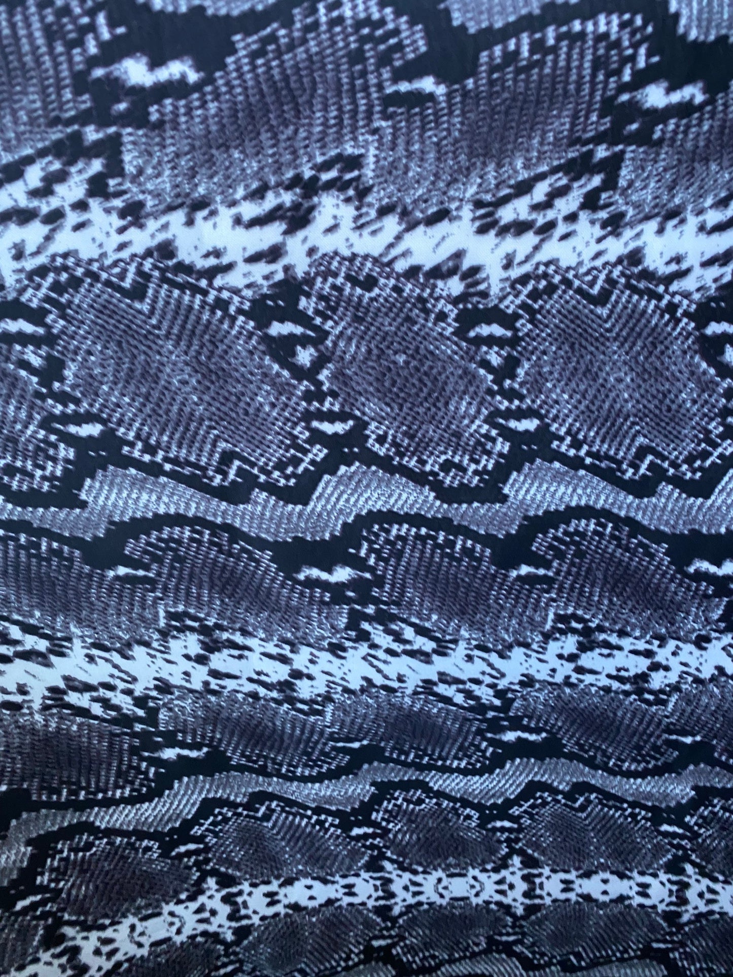 New exotic snake design gray/white/black print on poly techno 2-way stretch medium weight 58/60” Sold by the YD. Ships worldwide