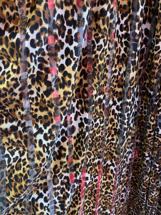 New leopard design stripe mesh spandex 4-way Stretch 58/60” Sold by the YD. Ships worldwide from Los Angeles California USA.