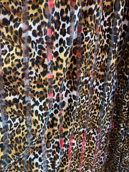 New leopard design stripe mesh spandex 4-way Stretch 58/60” Sold by the YD. Ships worldwide from Los Angeles California USA.