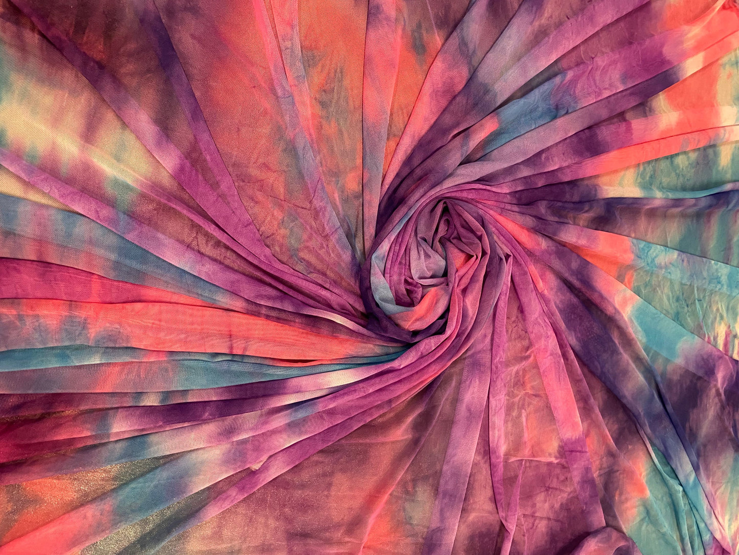 Cotton candy tie dye nylon power mesh 4-way stretch 58/60” Sold by the YD. Ships worldwide from Los Angeles California USA.