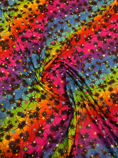 New rainbow Vegas design multi stars nylon spandex with foil 4-way stretch 58/60” Sold by the YD. Ships worldwide from Los Angeles CA USA.
